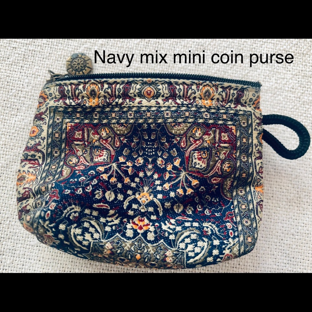 Cranberry mix color mini coin purse
Never used